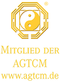 gelbes Logo mit Yin und Yang